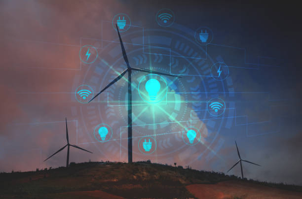istock Wind turbines with icon virtual screens under the sky for technology concept. Wind turbines generating electricity. 953139712