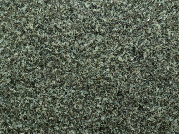 istock Black or dark granite abstract natural organic texture with rough surface used as background 953142406