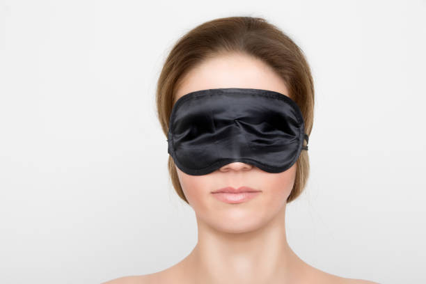 istock Gorgeous woman with black sleep mask 953148686