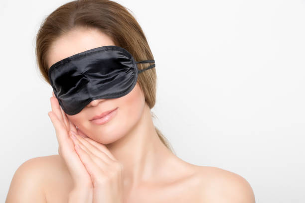 istock Gorgeous woman with black sleep mask 953148782