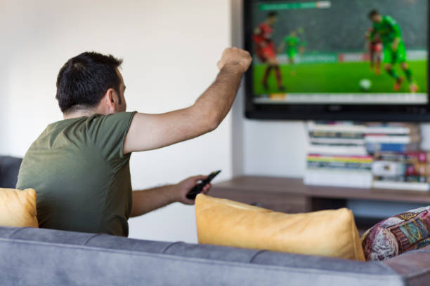 istock Man Watching Football Match 953149748