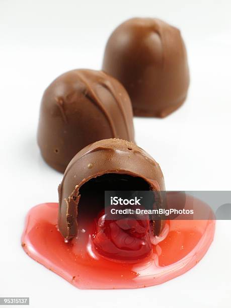 Three Cordial Cherries Stock Photo - Download Image Now - Broken, Brown, Candy