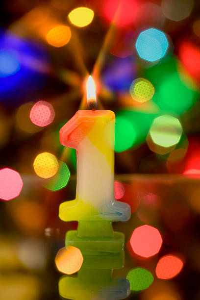 istock Candle number one on colorful background 95315271