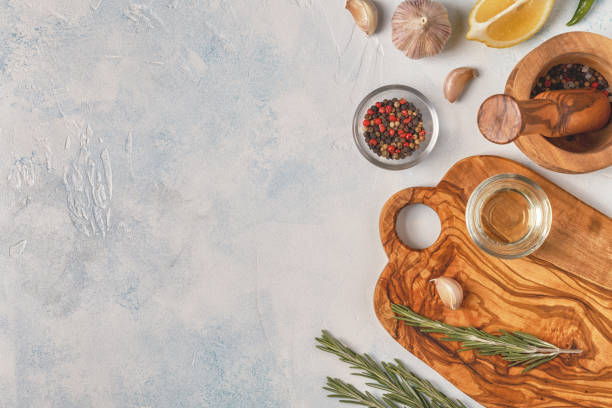 istock Cutting board and spice for cooking on a light background 953155648