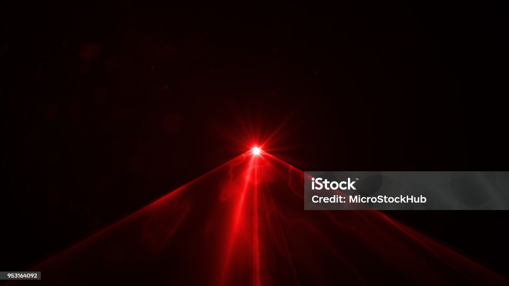 Lumière Laser rouge sur fond noir - Photo de Laser libre de droits