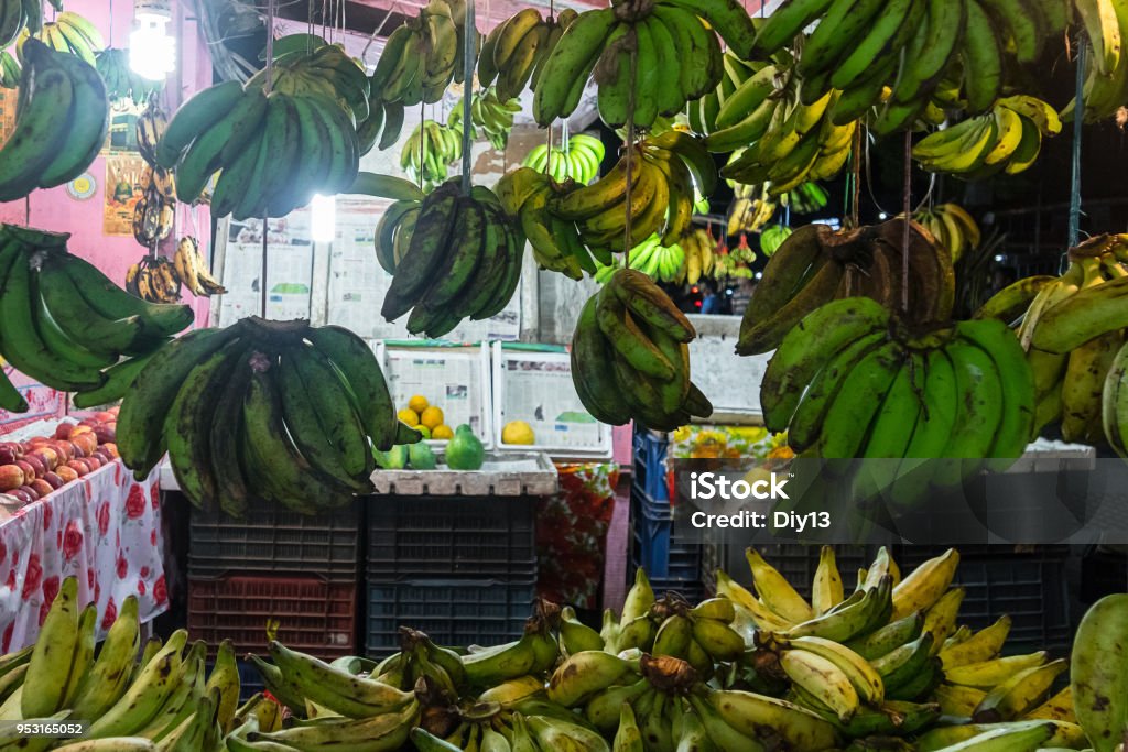 Green and yellow bananas for sale Green and yellow bananas for sale at street market Agriculture Stock Photo