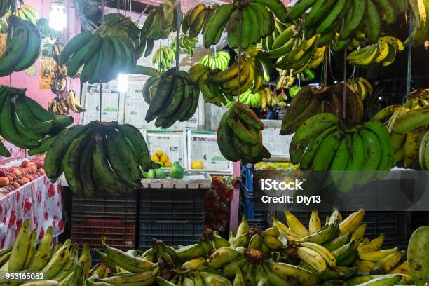 Green And Yellow Bananas For Sale Stock Photo - Download Image Now - Agriculture, Asia, Banana
