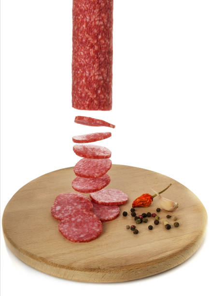 istock Sliced sausage on a board with spices 953167938