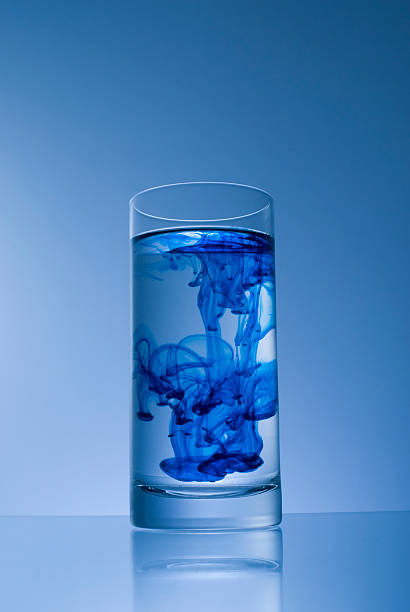 Cтоковое фото Чернильный стаканом воды