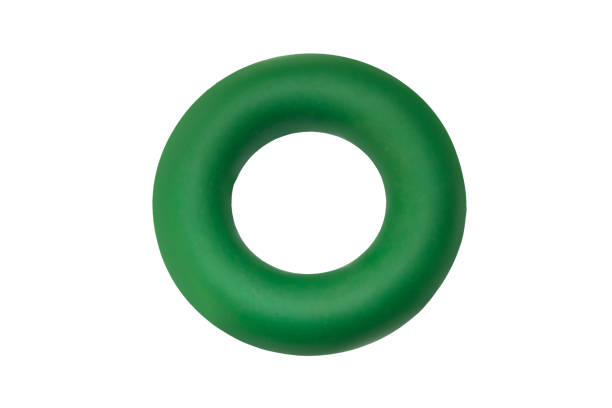 istock Green rubber hand expander isolated on white background 953173056