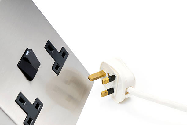 英国電力プラグ、ステンレス鋼ソケット - extension cord push button cable electric plug ストックフォトと画像