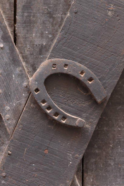 istock old rusty horseshoe on a door 953180400
