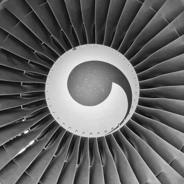 Frontal picture of jet aircraft engine fan in grey