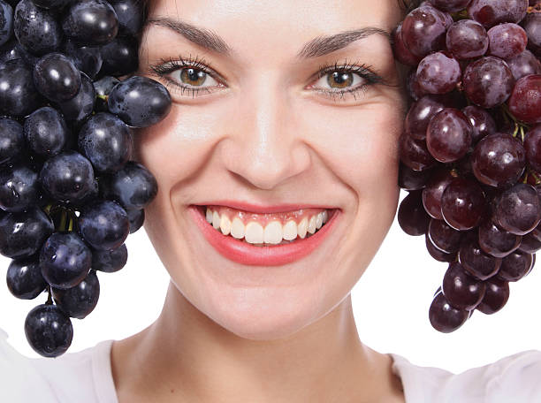 istock girl with grapes 95319379