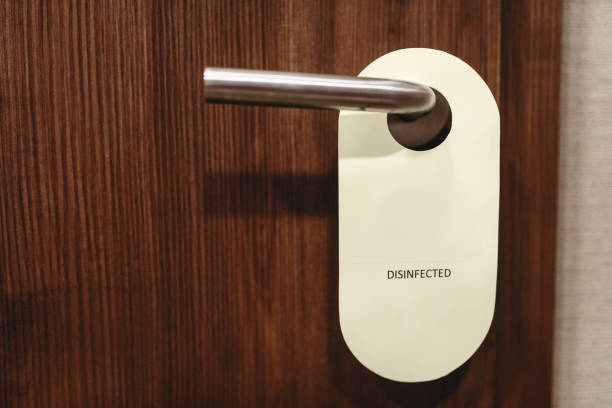 istock Door sign warning about disinfection 953201370