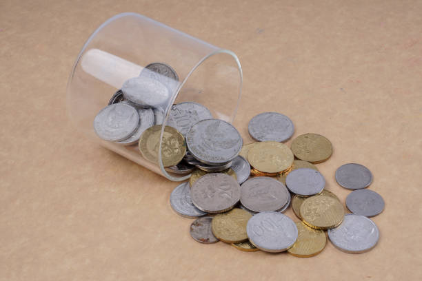 istock High Angle View Of Coins On Table 953211104