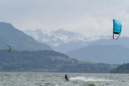 Zug, Canton Zug, Switzerland, April 29, 2018. The wind on the Zugersee was howling today and Zug's kite-surfers had a great Sunday.