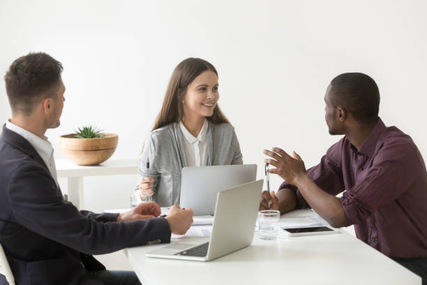 istock Creative millennial multiracial business team having discussion at office meeting 953226874