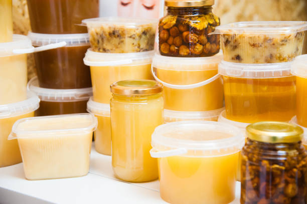 istock Sweet fresh honey in bottle on sale 953235900