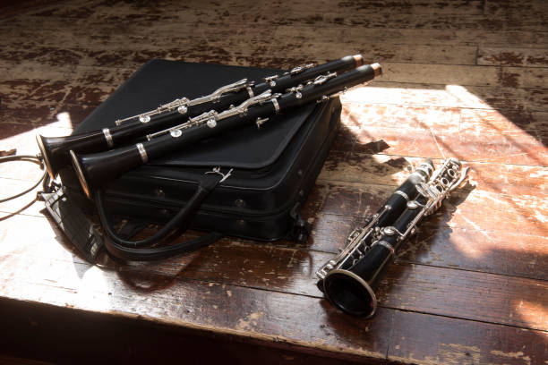 istock a clarinet resting on a wooden floor in sunlight 953239548