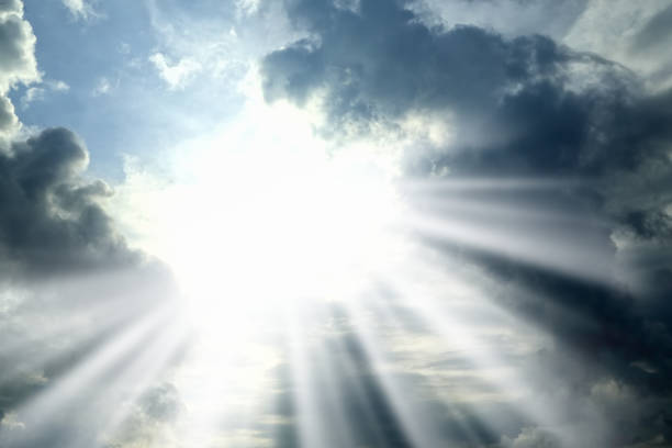 istock Cloudscape image of dramatic sky with storm clouds and sunbeam 953256156
