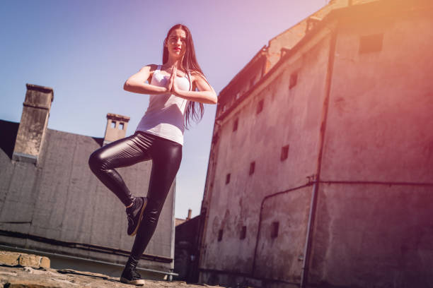 istock Attractive spontaneous woman exercising outdoors. 953256648