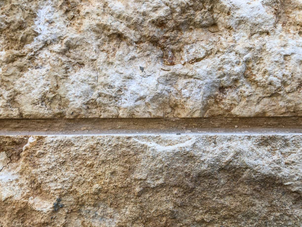 istock Close up of natural stone wall. Stone wall texture 953259918