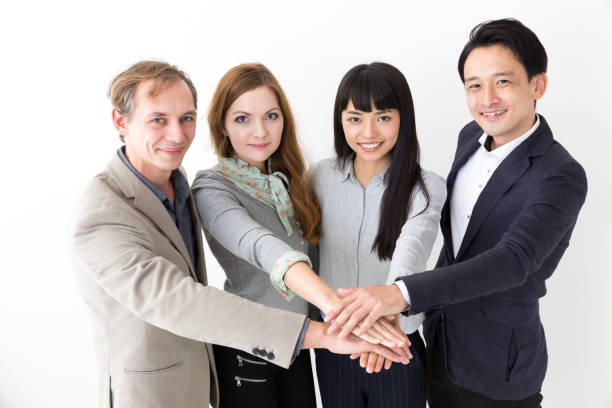 istock portrait of young business group on white background 953260136