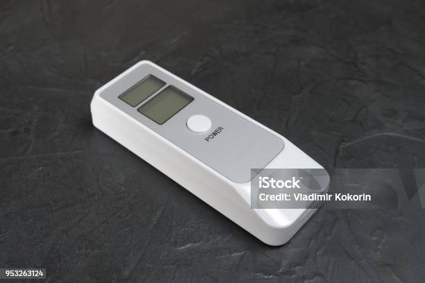 Device For Measuring The Degree Of Intoxication Stock Photo - Download Image Now - Alcohol - Drink, Blowing, Driving