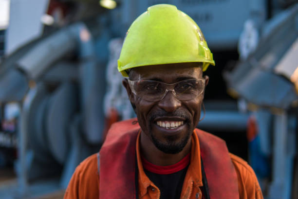 istock Seaman AB or Bosun on deck of vessel or ship , wearing PPE 953265266