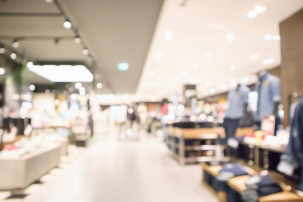 istock Abstract blur clothing boutique display interior of shopping mall background 953267708