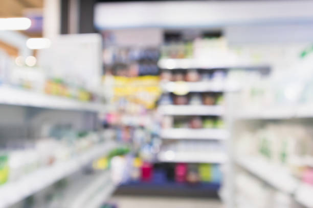 istock pharmacy drugstore shop interior blur background 953272540