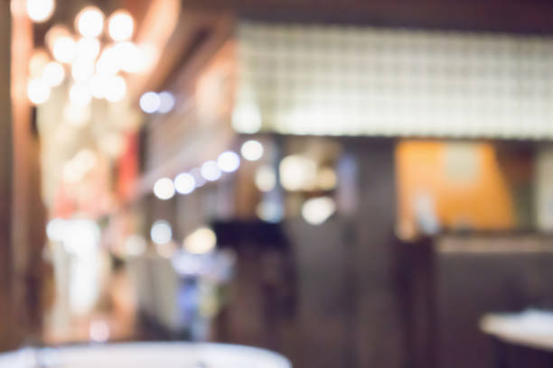 istock abstract blurred cafe restaurant with bokeh lights defocused background 953276658