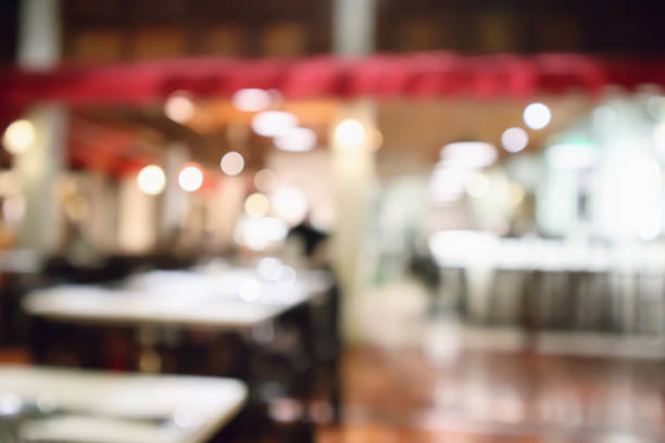 istock Restaurant cafe or coffee shop interior with people abstract defocused blur background 953276660