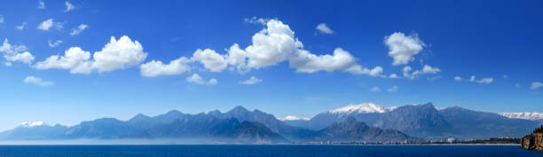 istock seascape image with high mountains over cloudy sky in Antalya 953281270