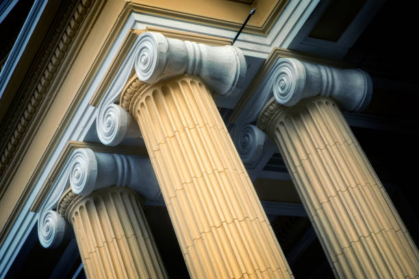 istock Close up yellow painted architectural column design from a Thailand Government building 953290810
