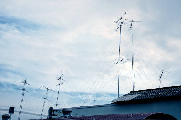 istock Classic old TV antenna on house roof 953296894