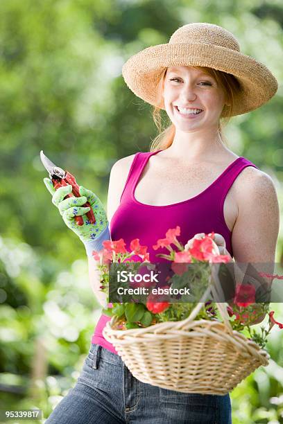 Smiling Pretty Woman Gardener Stock Photo - Download Image Now - 20-29 Years, Active Lifestyle, Adult