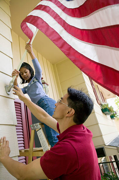 Raising the flag at home stock photo