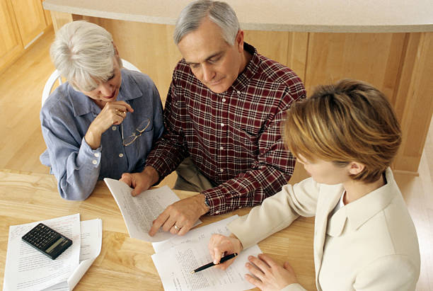 istock Senior couple meeting with agent 95339977