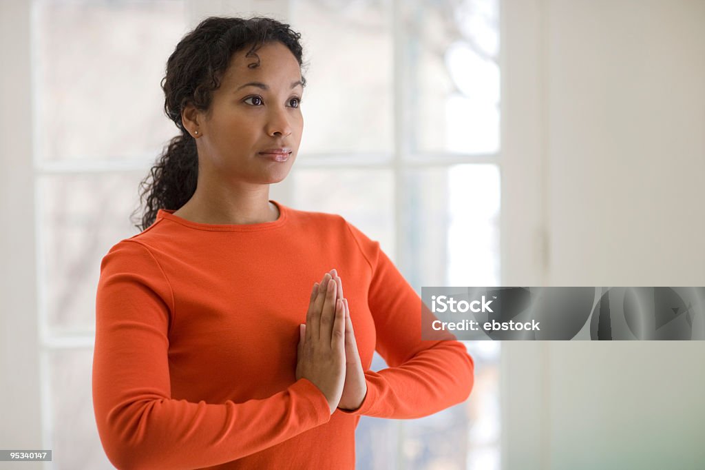 Pretty black woman practicing yoga  Adult Stock Photo