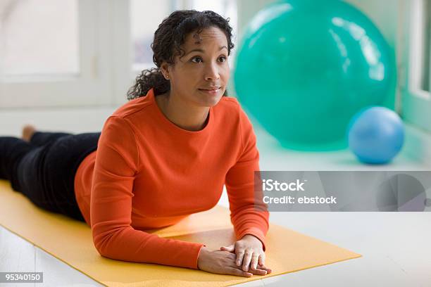 Pretty Black Woman Practicing Yoga Stock Photo - Download Image Now - Adult, Adults Only, African Ethnicity