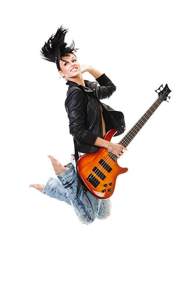 istock Beautiful rock-n-roll girl jumping with guitar 95340445
