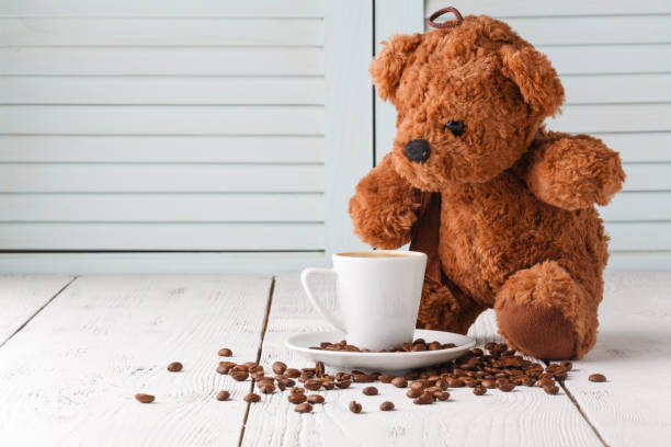 istock Teddy bear with cup of coffee 953425106