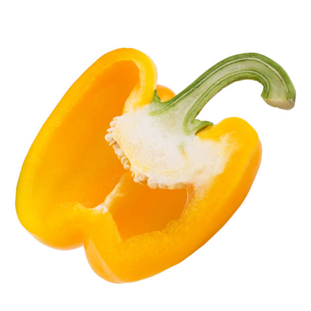 istock Half of fresh yellow pepper isolated on white background with clipping path 953427546