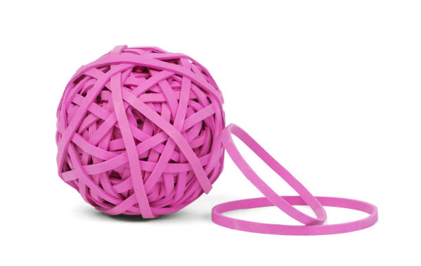 élastique de balle - rubber band rubber intertwined flexibility photos et images de collection