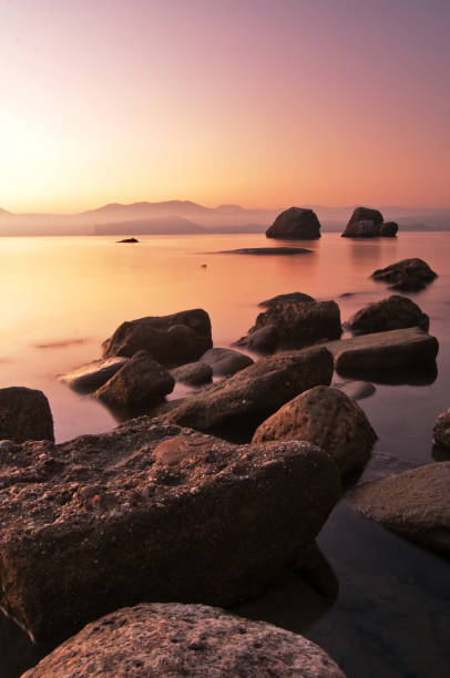 istock long exposure of sea and rocks 953429520