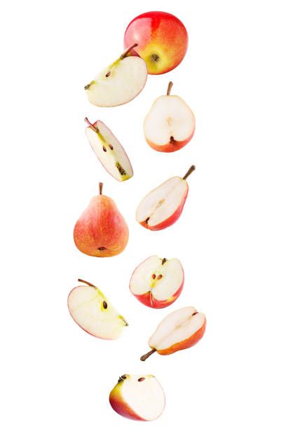 istock Falling sweet apple and pear isolated on white background with clipping path 953429602