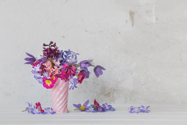istock beautiful spring flowers in pink vase 953431332