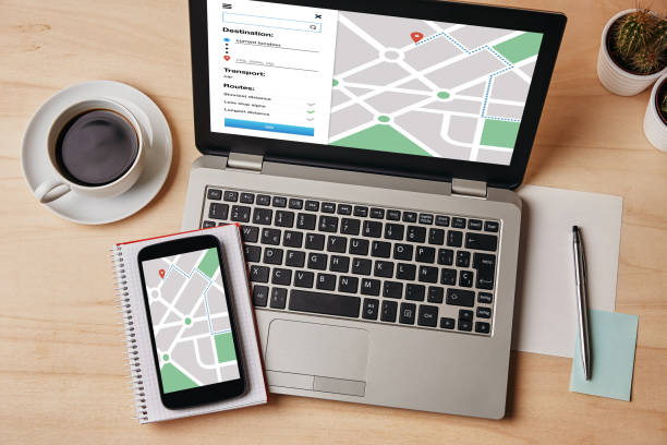 istock GPS map navigation app on laptop and smartphone screen. Location tracker concept 953432996